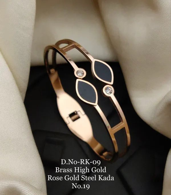 https://d1311wbk6unapo.cloudfront.net/NushopCatalogue/tr:f-webp,w-600,fo-auto/D.NO-RK-09 Brass High Rose Gold Steel Kada_1685186189346_7w7h34zaq71zwgk.jpg__Ketmera